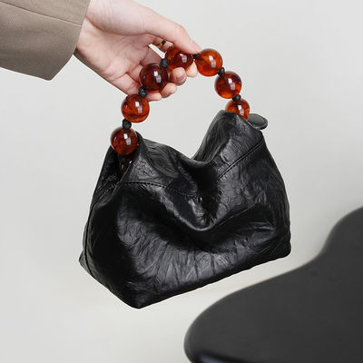Functional and Fashionable All-in-one Niche Design grade Pearl Hand Bill Shoulder Bag