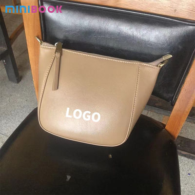 Upgrade Your Wardrobe with 2024 Spring's Flocked Cowhide Bag Versatile and Timeless