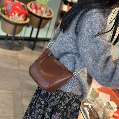 Upgrade Your Wardrobe with 2024 Spring's Flocked Cowhide Bag Versatile and Timeless