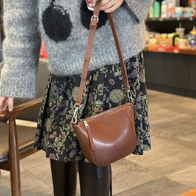 Upgrade Your Wardrobe with 2024 Spring's Flocked Cowhide Bag Versatile and Timeless
