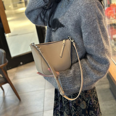 Upgrade Your Wardrobe with 2024 Spring's Flocked Cowhide Bag Versatile and Timeless