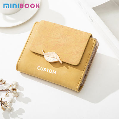 Custom Logo PU Leaf Buckle Zipper Folding Student Coin Purse for Simple and Practical